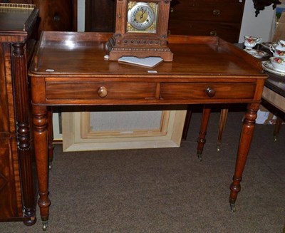 Lot 552 - A Victorian mahogany two drawer washstand