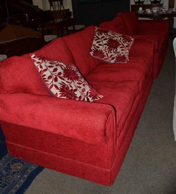 Lot 554 - A pair of two seater settees upholstered in crimson velour