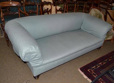 Lot 565 - A Victorian Chesterfield settee upholstered in green diapered weave