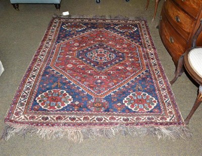 Lot 570 - Khamseh rug South West Persia, the stepped lozenge field with central medallion enclosed by...