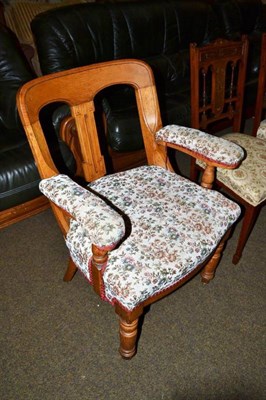 Lot 573 - A Victorian oak open armchair