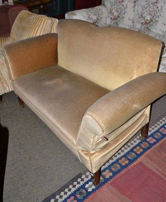 Lot 577 - An Edwardian drop-end settee, upholstered in yellow velvet, on square tapering legs with brass toes