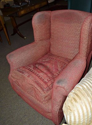 Lot 579 - Wing backed armchair