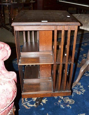 Lot 584 - An Edwardian oak revolving bookcase