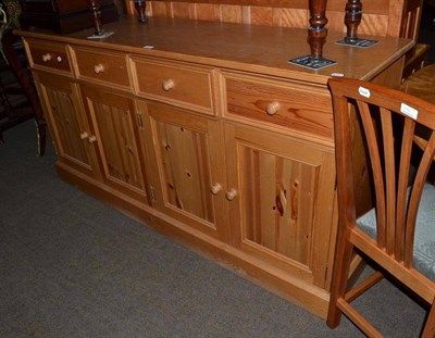 Lot 595 - A pine sideboard