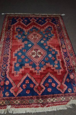 Lot 628 - Afshar rug South East Persia, the crenallated soft indigo field with two stepped medallions...