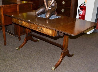 Lot 630 - A reproduction mahogany sofa table