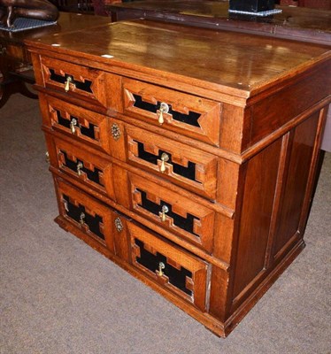 Lot 647 - 17th century oak chest of four drawers with ebonised front