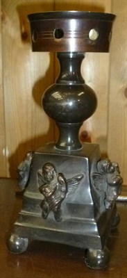 Lot 684 - Bronzed figure of a boy with a bag, a similar figure of a girl and boy, a lion and a lamp base (4)