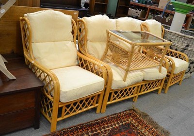 Lot 695 - A four piece conservatory suite