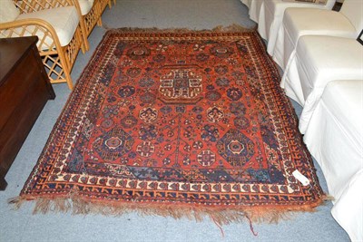 Lot 699 - Kashgai rug South West Persia, the burnt orange ground with numerous tribal motifs enclosed by...