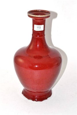 Lot 172 - A Chinese Sang de Boeuf Glazed Vase, Qing Dynasty, of ovoid form with knopped waisted neck and...