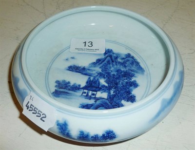 Lot 13 - A Chinese blue and white porcelain bowl finely painted with landscape scenes, 20th century