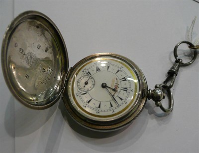 Lot 65 - A silver pocket watch with floral decorated dial