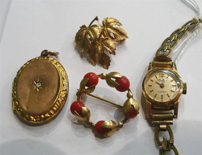 Lot 71 - Two brooches, a lady's wristwatch and a locket