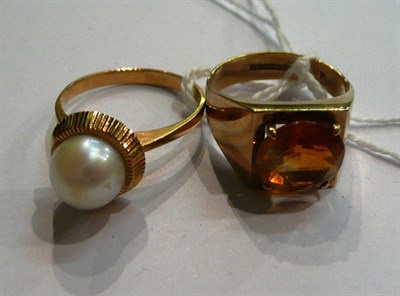 Lot 81 - A 9ct gold dress ring and a cultured pearl ring