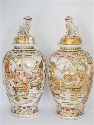 Lot 184 - A Pair of Japanese Earthenware Baluster Vases and Covers, early 20th century, with lion dog...