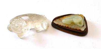 Lot 197 - A Chinese Jade Figure of a Cat, recumbent on a leaf, 6cm long, hardwood stand; and A Rock...
