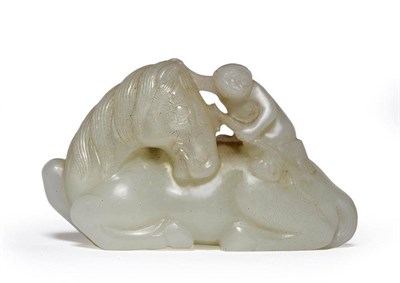 Lot 198 - A Chinese Pale Celadon Jade Figure Group, of a monkey on the back of a recumbent horse, 7cm long