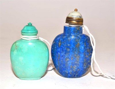 Lot 203 - A Chinese Lapis Lazuli Snuff Bottle, Qing Dynasty, 19th century, of spade form, with brass...