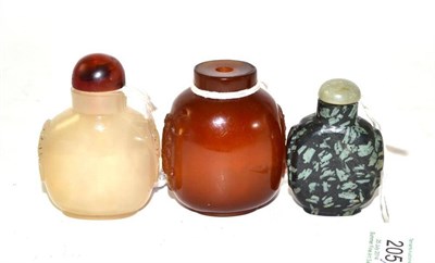 Lot 205 - Three Chinese Snuff Bottles, Qing Dynasty, 19th century, comprising two glass examples, and a...