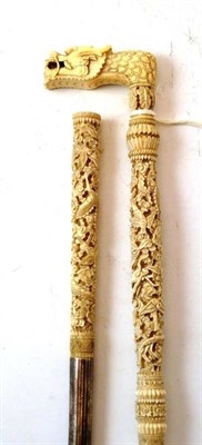 Lot 207 - A Cantonese White Metal Mounted Ivory Walking Stick, late 19th/early 20th century, the handle...