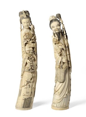 Lot 209 - A Pair of Chinese Ivory Figures, early 20th century, of a sage standing holding a staff and a...