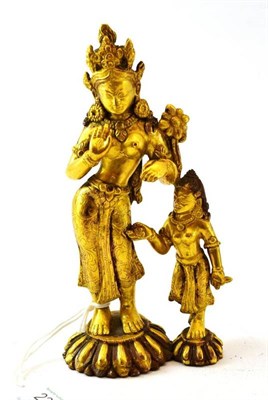 Lot 234 - A Gilt Bronze Figure of a Goddess and Attendant, probably Nepalese, 17th century, each standing...