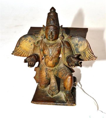 Lot 236 - An Indian Bronze Figure of a Giruda, probably 18th century, kneeling, his arms and wings...