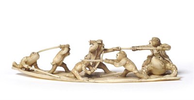 Lot 241 - A Japanese Ivory Okimono, Meiji period, as a group of monkeys and toads fighting with swords...