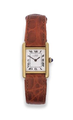 Lot 251 - A Lady's Silver Gilt Rectangular Wristwatch, signed Must de Cartier, model: Tank, circa 1985,...