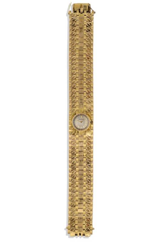 Lot 260 - A Lady's 18ct Gold Wristwatch, signed Movado, 1960, lever movement, silvered dial with applied...