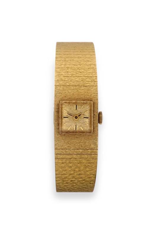 Lot 262 - A Lady's 18ct Gold Wristwatch, signed Eterna Watch Co, circa 1965, lever movement, textured...