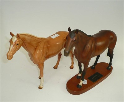 Lot 8 - Beswick Palomino thoroughbred (large size) and a Beswick Ban racehorse on plinth