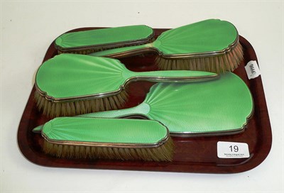 Lot 19 - A silver and green enamel five piece dressing table set