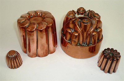 Lot 23 - Four copper jelly moulds