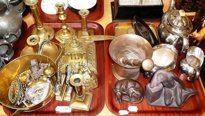 Lot 34 - Two trays of assorted brass ware, pestle and mortar and horse brasses