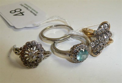 Lot 48 - A band ring, a blue zircon cluster ring, a 9ct gold fancy ring and a damaged ring head