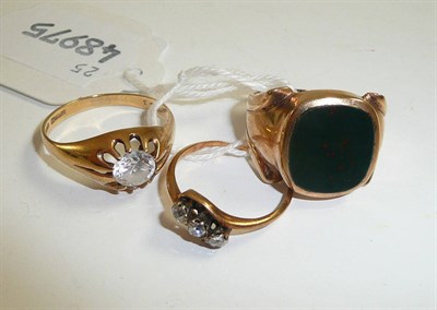 Lot 49 - A 9ct gold bloodstone ring, a 9ct gold signet ring and a diamond three stone ring