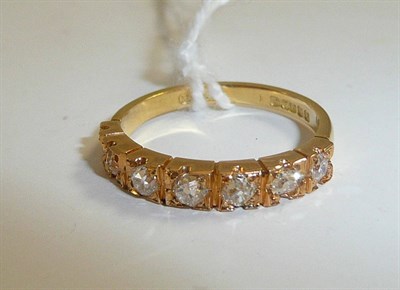 Lot 66 - An 18ct gold diamond half eternity ring