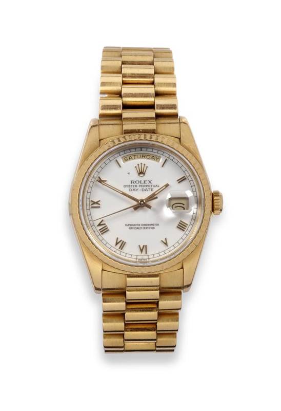 Lot 270 - An 18ct Gold Automatic Calendar Centre Seconds Day/Date Wristwatch, signed Rolex, Oyster Perpetual