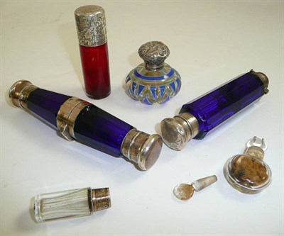 Lot 78 - A ruby glass scent with silver top by Sampson and Mordon, two blue glass double scents and...