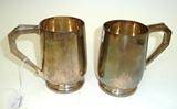 Lot 95 - Two silver mugs engraved with initials