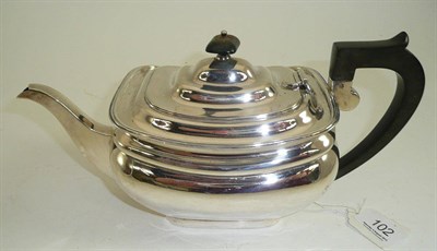 Lot 102 - A silver teapot