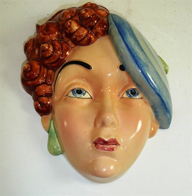 Lot 104 - A Beswick mask wall plaque as a young woman with auburn curls and wearing a blue beret