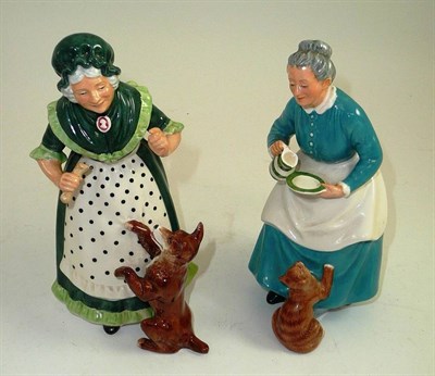 Lot 107 - Royal Doulton figures 'Old Mother Hubbard' HN2314 and 'The Favourite' HN2249 (2)