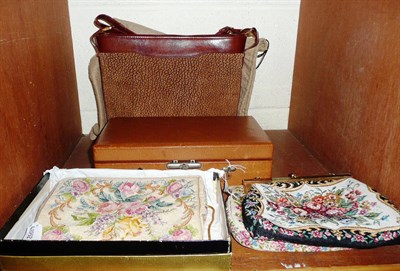 Lot 128 - An evening bag, a buffalo leather handbag, a jewellery box and two needlework bags