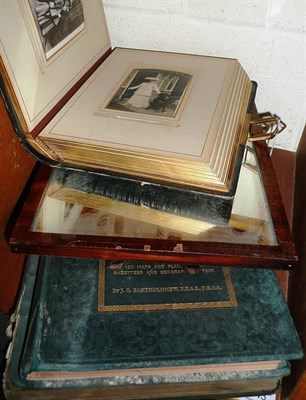 Lot 143 - A Victorian leather bound photograph albums, a strut mirror and two other books