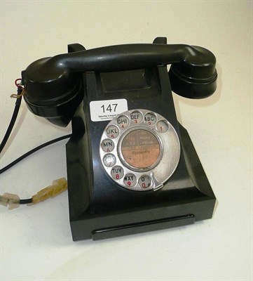 Lot 147 - A Bakelite telephone