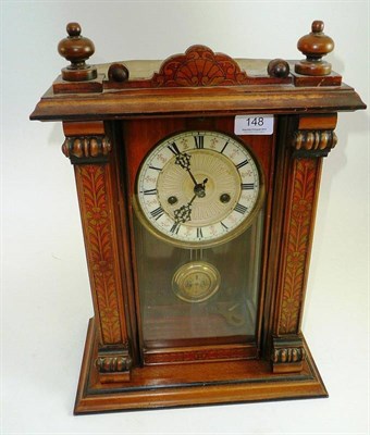 Lot 148 - A striking mantel clock